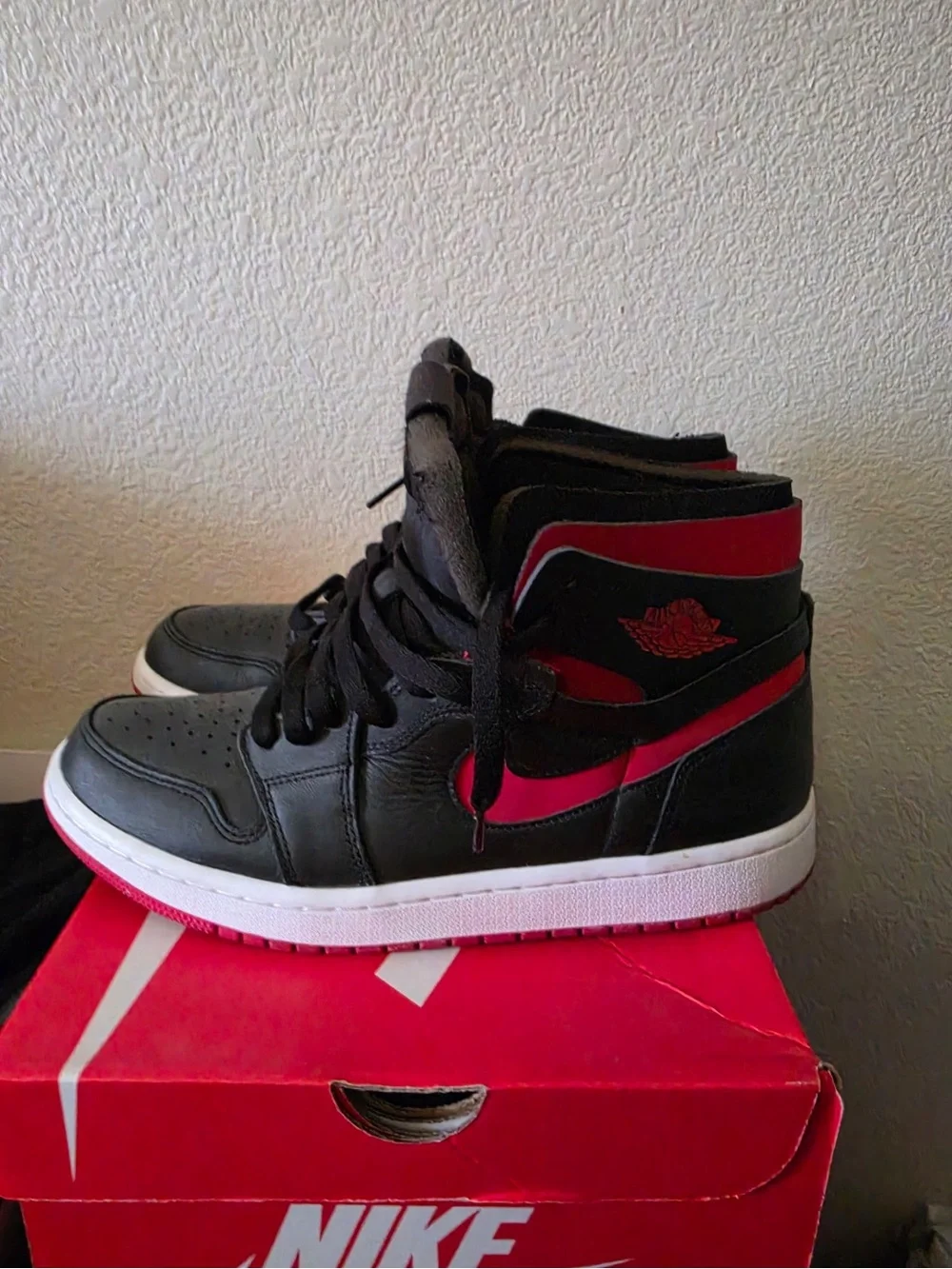 Nike Black and Red High-Top Zoom Air Sneakers